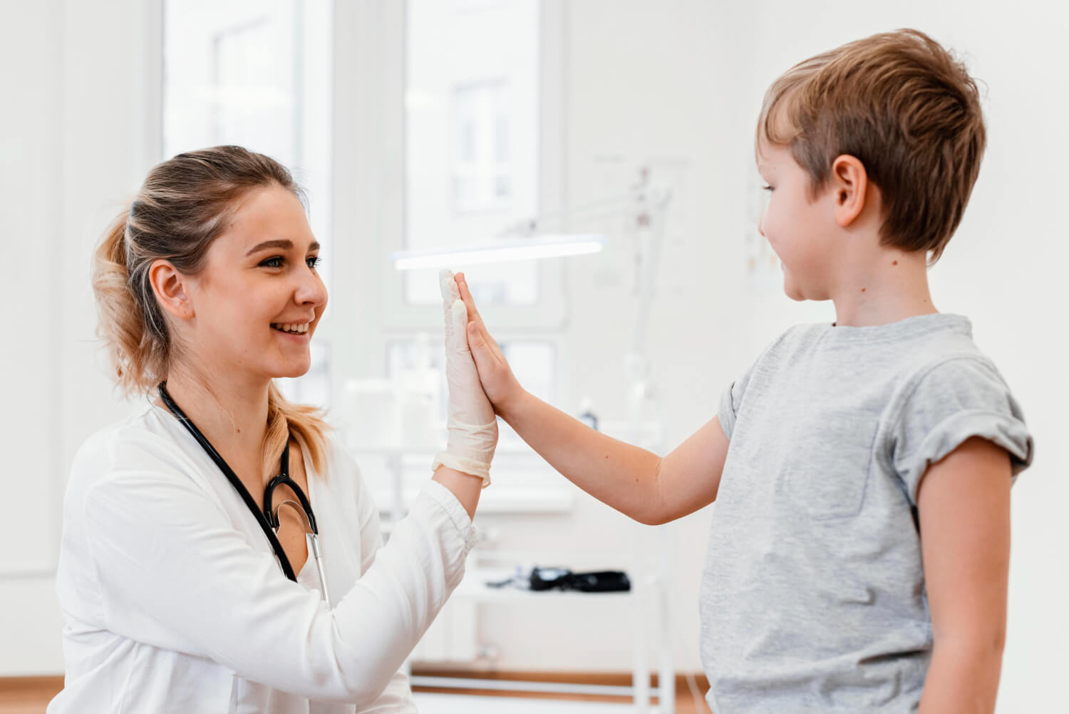 pediatric specialist interacting with child