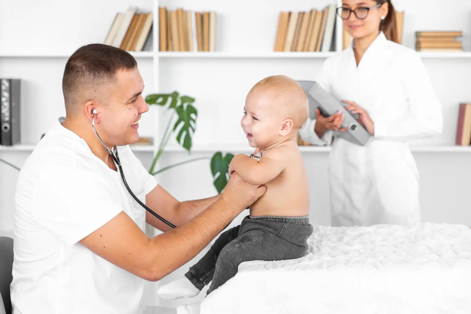 young-doctor-listening-adorable-baby